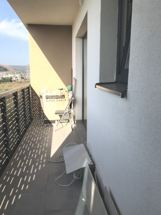 Apartament finisat la etaj intermediar