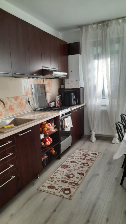 Apartament de 2 camere decomandate, 50 MP, grădina de 38 MP si loc de parcare