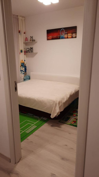 Apartament de 2 camere decomandate, 50 MP, grădina de 38 MP si loc de parcare