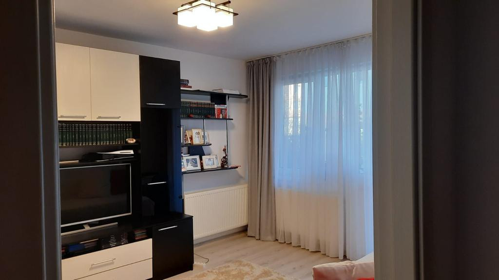 Apartament de 2 camere decomandate, 50 MP, grădina de 38 MP si loc de parcare