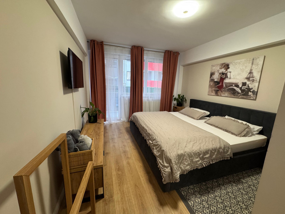 Apartament de 2 camere, 59 mp utili + gradina,  zona Teilor